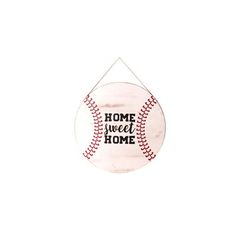 a baseball hanging on a wall with the words home sweet home written in black ink