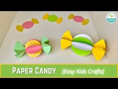 two paper candy fish on top of each other with the words paper candy easy kids crafts