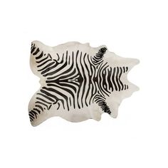 a zebra rug with black and white stripes on it's back end, in the shape of a rhinoceros