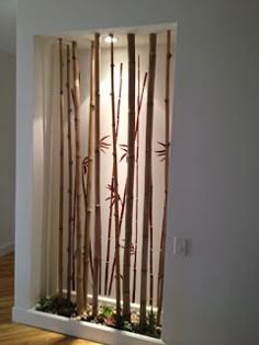 an open window with bamboo sticks in it