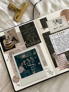 an open scrapbook with pictures and writing on the pages that are covered in paper