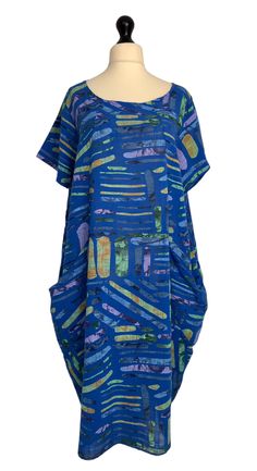 . Made from 100% cotton in a vibrant quirky stripe pattern , loose fitting shift dress style with short sleeves and 2 side hip pockets . One size - to fit UK sizes 14 16 18 20 . Bust measures : 48 inches . Length from back of neck to bottom hem : 40 inches . Brand new with tags . Visit our shop for lots more gorgeous quirky lagenlook fashion !! Blue Short Sleeve Lagenlook Dress, Blue Oversized Short Sleeve Dress, Oversized Blue Short Sleeve Dress, Blue Cotton Dress With Side Pockets, Striped Short Sleeve Dresses With Pockets, Blue Short Sleeve Dress With Side Pockets, Shift Dress Styles, Lagenlook Style, Couture Mode