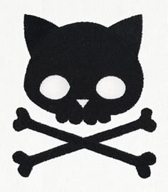 a black cat skull and crossbones on a white background