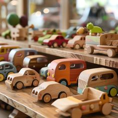 wooden toys are lined up on shelves in a toy store, including cars and trucks