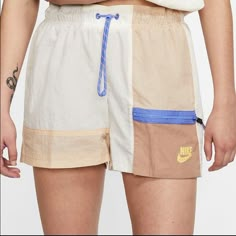 Nwt Size Xl Nike Shorts. It Has 2 Front Pockets, 1 Back Pocket, 1 Zip Pocket And Is Mesh Lined. Outside Material Has The Parachute/Swishy Feel. Color Is Multicolored Including Tan, Cream/Off-White, Periwinkle. Style Is Loose Fit. Rare!!! Upcycled Sportswear, Veil Icon, Celana Fashion, Lounge Clothes, Biker Shorts Outfit, Skirt Swimsuit, Women's Sportswear, Swimsuit Women, Shorts Nike