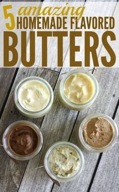 five jars filled with homemade flavored butters sitting on top of a wooden table