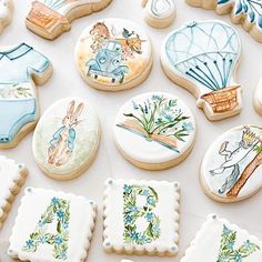 decorated cookies are laid out on a table