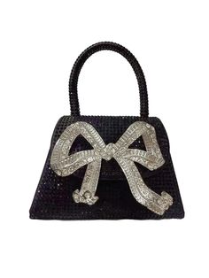 This Koko Bow Embellished Mini Tote Bag In Black is the perfect accessory for any fashionista. Its bow embellishments and petite size make it a fashionable and functional accessory. Featuring a roomy main compartment and extra pockets, it offers ample storage space while maintaining its stylish appeal.Material: PU Luxury Shoulder Bag With Bow For Party, Luxury Party Shoulder Bag With Bow, Black Formal Bag With Bow, Formal Black Bag With Bow, Luxury Party Bag With Detachable Bow, Black Rectangular Bag With Bow, Evening Shoulder Bag With Bow And Top Handle, Luxury Party Bag With Bow, Black Party Bags With Bow Detail