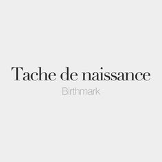 the words tache de naissance are in black and white