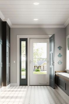 an empty hallway with two doors and a bench in the center, leading to a front door