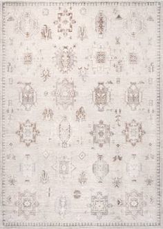 an area rug with various designs and colors on the floor, including beiges and browns