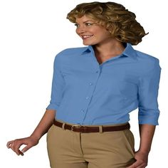 Soft collar accents this easy care 3/4 sleeve poplin blouse. Tailored for a womans curves it may be worn tucked or untucked. Perfect for restaurants hotels or resorts-65 Percent Poly/35 Percent Cotton; 4.0/4.25 oz. wt-3/4 sleeve with soft collar-Shaped blouse with two back darts-Matching buttons and no pocket-Fabric wicks moisture-Soil release and wrinkle resistant-Laundry friendly Size: 2XL.  Color: Blue.  Gender: female.  Age Group: adult. Womens Shirts Casual, Banded Collar Shirts, Poplin Blouse, Womens Tops Dressy, Women's Button Down Shirt, Denim Blouse, Collars For Women, Womens Long Sleeve Shirts, Women Sleeve