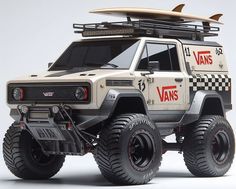 an off - road vehicle with a surfboard on top