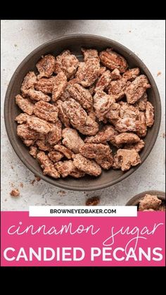 cinnamon sugar candied pecans in a bowl with the words cinnamon sugar candies