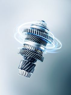 an abstract image of gears spinning in the air with blue and gray background, including lightening