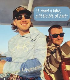 two men sitting on a boat in the water and one has a speech bubble above his head that says i need a lake, a little bit of bat