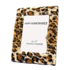 an animal print frame with the words happy homewares printed on it's side