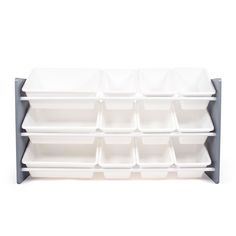 a large white shelf with several trays on it's sides and two rows of plastic bins in the middle