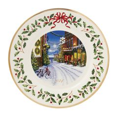 a plate with a christmas scene painted on it