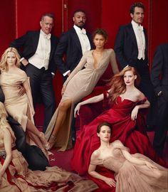 the cover of vanity fair magazine featuring models in evening gowns and tuxedos