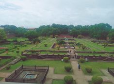 an aerial view of a large garden with lots of trees