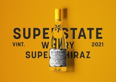 a bottle of wine sitting on top of a yellow background with the words super state winery