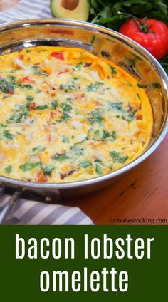 bacon lobster omelette with spinach and tomatoes in a casserole dish