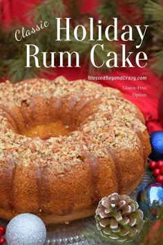 a bundt cake sitting on top of a glass platter next to christmas decorations