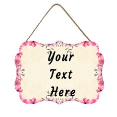 a sign that says your text here with pink flowers on the front and back of it