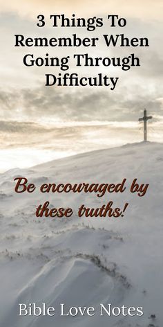 a cross on top of a snowy hill with the words 3 things to remember when going through difficulty