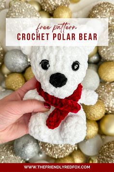 a white teddy bear with a red scarf around it's neck and the words free pattern crochet polar bear