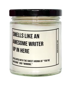 a jar with some writing on it that says smells like an awesome writer up in here