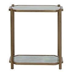 a gold metal and glass shelf with two shelves on each side, against a white background