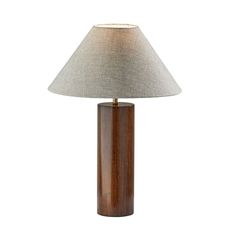 a table lamp with a wooden base and fabric shade on the top, against a white background