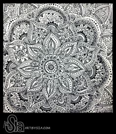 an intricate black and white drawing on paper