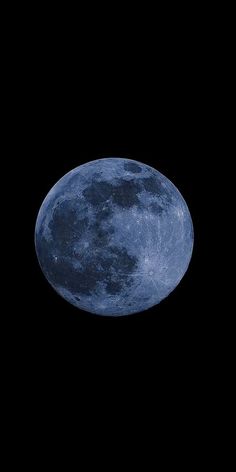 the full moon is seen in the dark sky