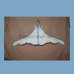 a white and blue hanger hanging from the ceiling