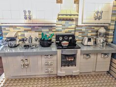 a toy kitchen with an oven and stove