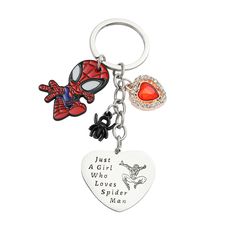 a spiderman heart shaped keychain with two charms attached to it, and the words just a girl who loves spider man