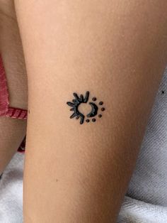 a woman with a tattoo on her leg