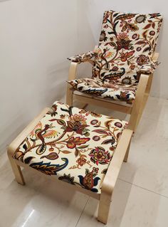 two chairs and a footstool in a room with white tiles on the floor