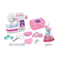 a toy sewing machine with accessories for dolls