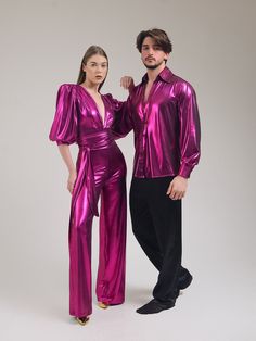 "Our matching Studio 54 party outfit is a special twin set, a piece of design that will make you feel different and special at all parties, festivals, disco-themed entertainments. Bright fuchsia wide sleeve, wide leg, deep V jumpsuit and our bright shirt with wide collar for partner is ready to fascinate everyone! The fuchsia jumpsuit with metallic reflections is quite ambitious with a deep V-neckline. It also has a noble appearance. This is exactly a piece of design. A great piece for private p Fitted V-neck Evening Sets, Fitted Festive Sets For Costume Party, Fitted Party Sets, Fitted Party Sets For Party Season, Fitted Sets For Party Season, Fitted Long Sleeve Party Set, Fitted Sets For Party Season Celebration, Fitted Full-length Evening Sets, Pink Fitted Costume Party Set