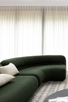 Green curved sofa in modern living room Green Sofa Design, Green Modular Sofa, Green Curved Sofa, Moss Green Corner Sofa, Green Sofa Decor, Green Velvet Sofa Circular, Boucle Sofa Green, Green Corner Sofas, Curved Couch