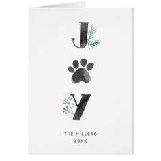 a greeting card with the letter j and an animal's paw print on it