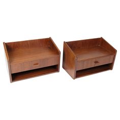 two wooden boxes with one drawer open and the other closed