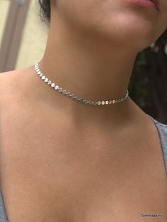 "\" THE DISCO CHOKER \" Trendy and fashionable! Super popular disc choker necklace is a must have. This gorgeous silver disc choker will compliment your outfit and its perfect for layering! You can even wrap it around twice to be a bracelet L E T S . T A L K . C H O K E R S ✤ Available in 14k Gold Filled or Sterling Silver ✤ Size - 12\" ✤ OPTIONAL * Please choose from drop down box - 1\" or none - Extension from clasp for an adjustable length. All purchased items will arrive in a Tommassini Jewe Silver Minimalist Choker With Adjustable Chain, Minimalist Silver Choker With Adjustable Chain, Dainty Silver Choker With Adjustable Chain, Dainty Silver Choker With Delicate Chain, Trendy Adjustable Silver Choker, Minimalist Silver Choker With Clavicle Chain, Minimalist Silver Choker With Silver Chain, Nickel Free Round Silver Choker, Sterling Silver Choker With Silver Chain