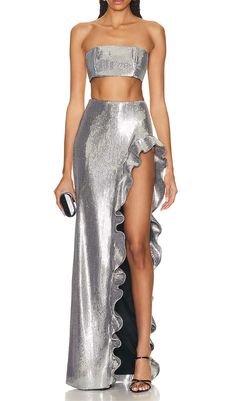 This new two-piece suit is perfect for a night out on the town! The sequined bandeau top is sure to turn heads. while the silver hue will make you shine. The slim-fit pants are comfortable and flattering. making this the perfect outfit for a night of dancing.Gentle Dry Clean OnlyColour may vary due to lighting on images. The product images (without model) are closest to the true colour of the product.Item runs true to size chart and is cut to suit our size chart. Please refer to our size chart f