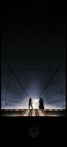 two people standing in front of a star wars scene with lights coming from the ceiling