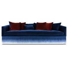 a blue couch with red pillows sitting on it's back and the seat is upholstered